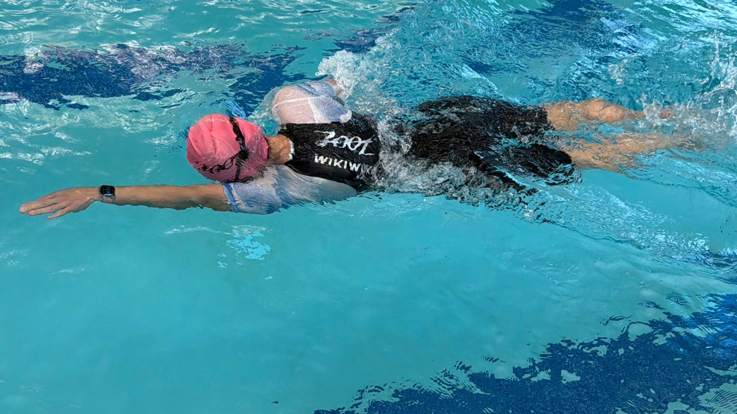 Women swimming in swimskin