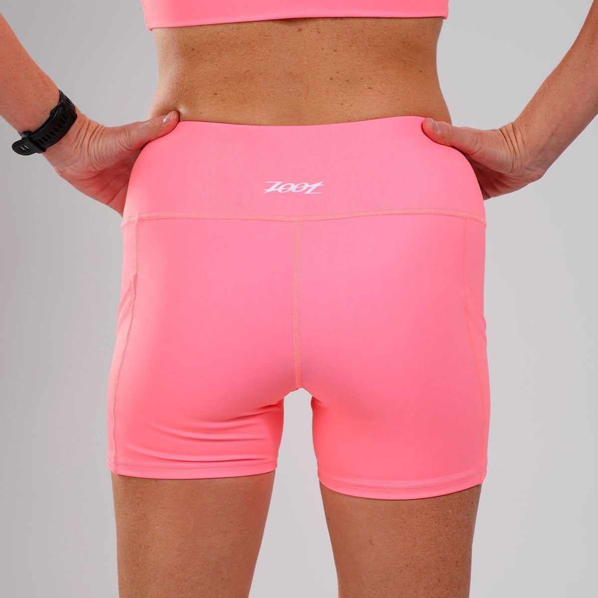 Zoot Sports RUN BOTTOMS Women's LTD Run Pulse Short - Neon Coral