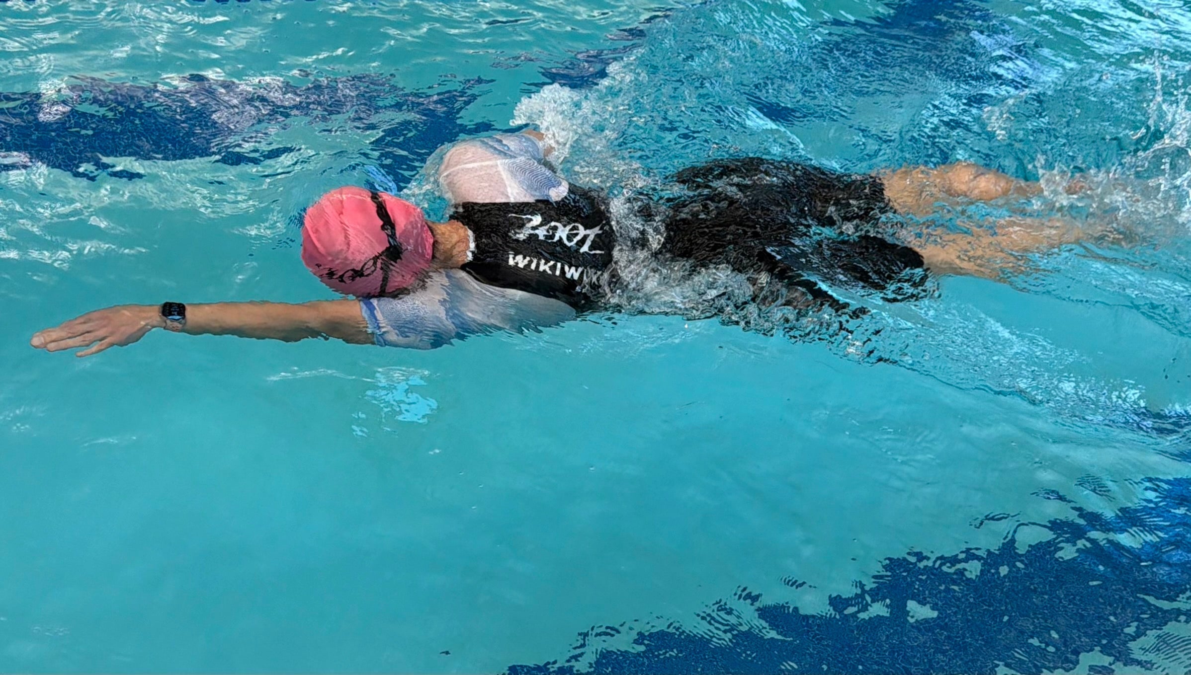 Women swimming in swimskin