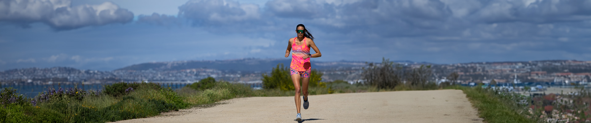Women's running in Zoot Aloha collection tank and short