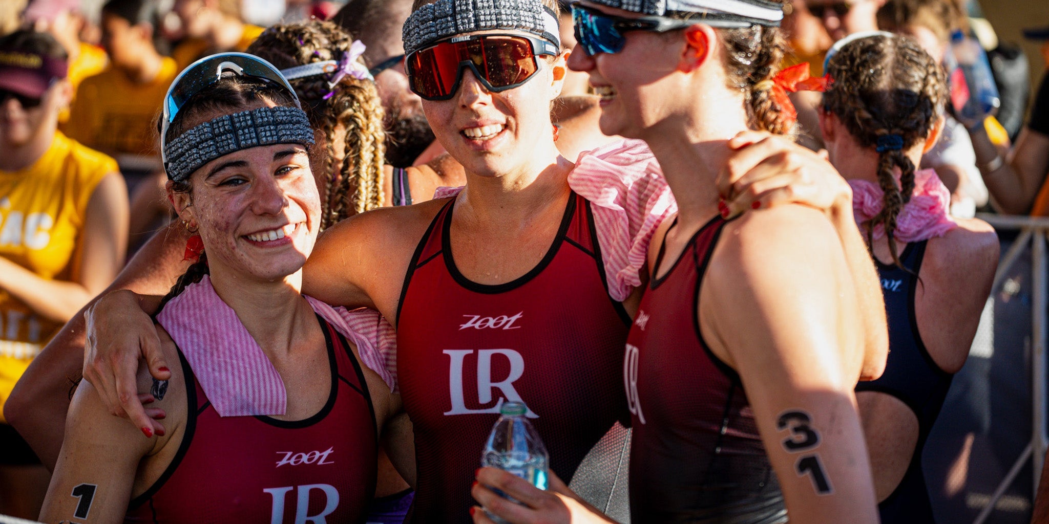 Group of athletes in Zoot custom race kits