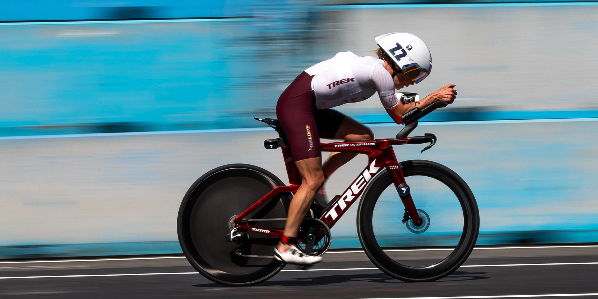 Professional women athlete on bike