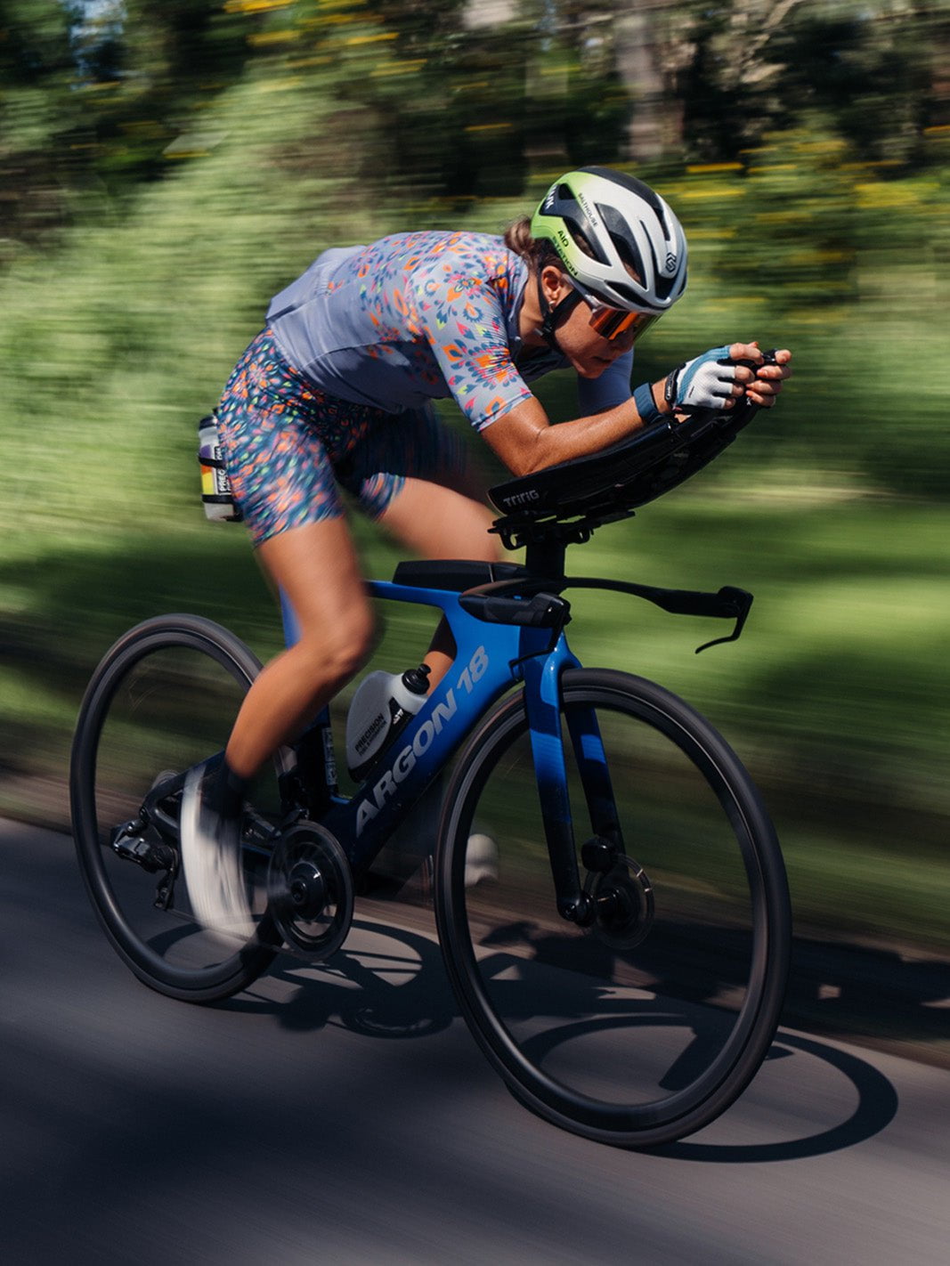 Ellie Salthouse cycling in Kaleidoscope kit