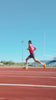 Runner on track in performance running clothes