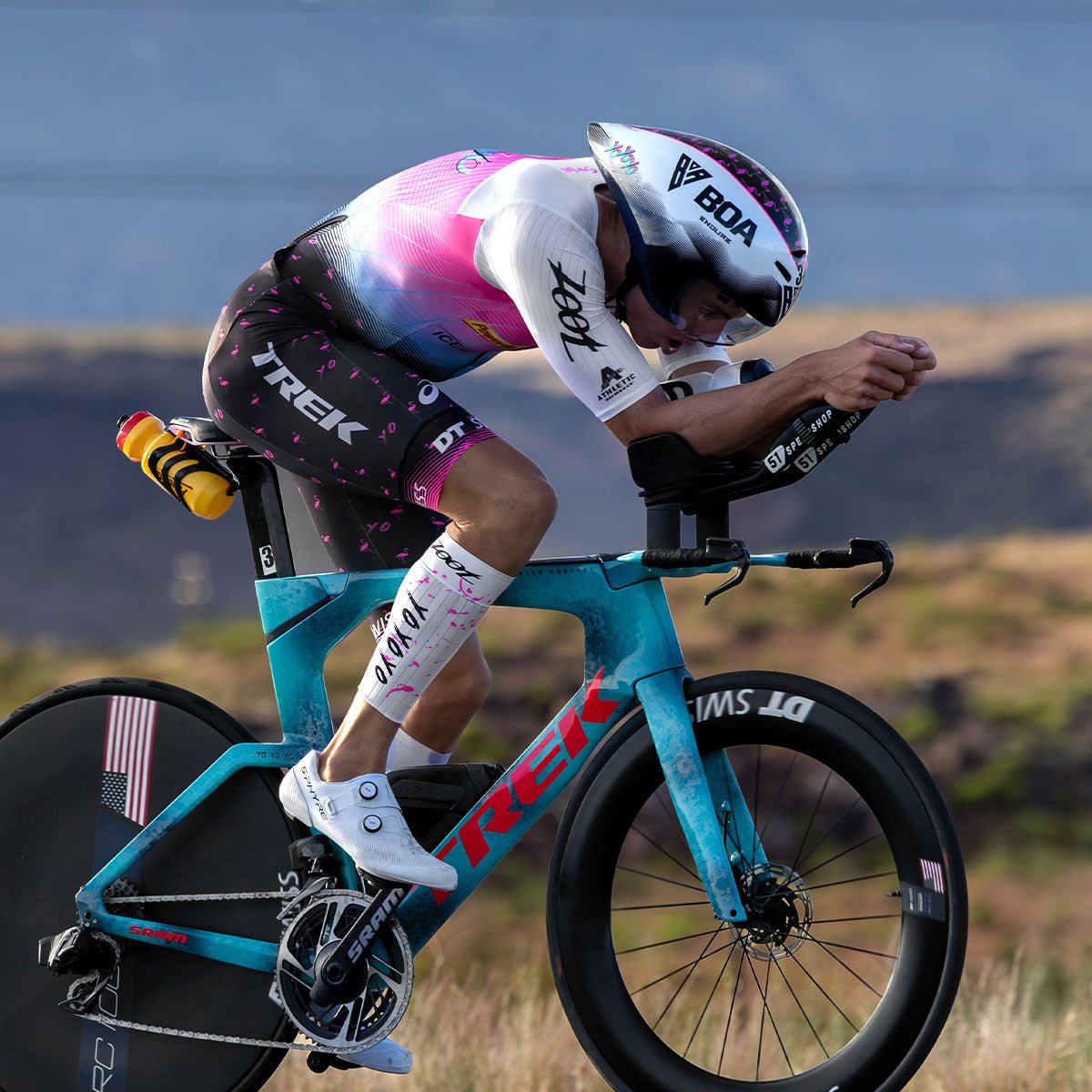 Sam Long racing wearing the Elite Aero Calf Sleeves - White