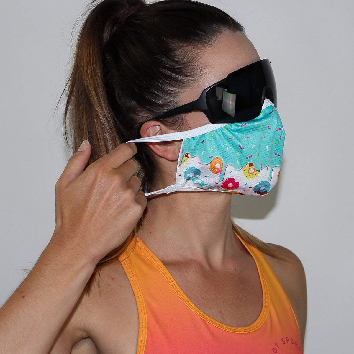 https://zootsports.com/cdn/shop/products/zoot-sports-face-coverings-unisex-face-mask-donut-15627852120143_1200x1200.jpg?v=1628011326